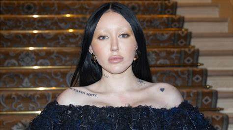 Noah Cyrus Frees the Nipple During Paris Fashion Week Outing With Fiancé Pinkus